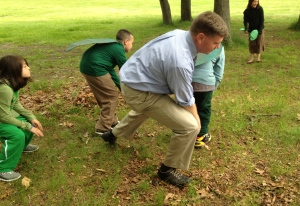 Mr. Wishart gets into the action, demonstrating turtle movement direction for his fourth grade students.